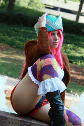 Rule 34 | 1girl, boots, breasts, cosplay, fur jacket, high heel boots, high heels, jacket, jewelry, jewelry bonney, jewelry bonney (cosplay), legs, lipstick, makeup, one piece, outdoors, photo (medium), pink hair, shoes, shorts, sitting, striped clothes, striped shorts, tank top, thighhighs
