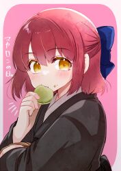 1girl absurdres blue_bow blush bow commentary eating food food_on_face hair_bow half_updo highres holding holding_food japanese_clothes kimono kohaku_(tsukihime) light_blush long_sleeves looking_at_viewer macaron pink_background red_hair shimotsukishin short_hair solo translated tsukihime upper_body wide_sleeves yellow_eyes