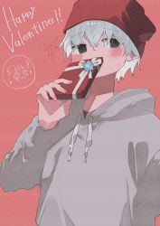 Rule 34 | 1boy, bad id, bad pixiv id, beanie, blush, commentary request, covering own mouth, drawstring, embarrassed, gift, green eyes, grey hoodie, hand up, happy valentine, hat, highres, holding, holding gift, hood, hood down, hoodie, long sleeves, looking at viewer, male focus, no pupils, original, outdoors, potg (piotegu), red hat, ribbon, short hair, signature, solo, white hair, white ribbon