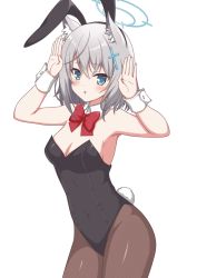 Rule 34 | 1girl, animal ear fluff, animal ears, black leotard, black pantyhose, blue archive, blue eyes, bow, bowtie, commentary request, cowboy shot, cross hair ornament, detached collar, fake animal ears, grey hair, hair ornament, halo, leotard, medium hair, mun (gunma), pantyhose, playboy bunny, rabbit ears, rabbit pose, rabbit tail, shiroko (blue archive), simple background, solo, standing, strapless, strapless leotard, tail, white background, wrist cuffs