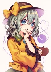 Rule 34 | 1girl, bow, chocolate, commentary request, food, frilled shirt collar, frills, green eyes, green hair, green nails, green skirt, hair between eyes, hat, hat bow, head tilt, heart, heart-shaped food, heart of string, highres, holding, holding chocolate, holding food, komeiji koishi, kyouda suzuka, looking at viewer, nail polish, shirt, short hair, simple background, skirt, smile, solo, third eye, tongue, tongue out, touhou, upper body, white background, yellow bow, yellow shirt