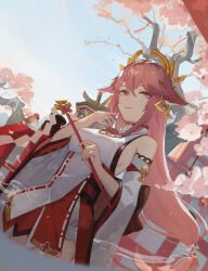 Rule 34 | 1girl, absurdres, animal ears, bare shoulders, bird, blue sky, breasts, cherry blossoms, closed mouth, commentary request, cowboy shot, detached sleeves, dutch angle, earrings, floppy ears, fox ears, genshin impact, gohei, hand up, highres, holding, holding gohei, jewelry, long hair, looking at viewer, low-tied long hair, medium breasts, nontraditional miko, outdoors, pink eyes, pink hair, pink nails, riknz, shide, shirt, sideboob, sky, sleeveless, sleeveless shirt, smile, solo, sparrow, tree, very long hair, white shirt, white sleeves, wide sleeves, yae miko