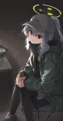Rule 34 | 1girl, 26th, black pantyhose, black scarf, blue archive, blush, chair, closed mouth, food, green eyes, green halo, green jacket, grey footwear, grey hair, grey hat, halo, hare (blue archive), hare (camp) (blue archive), hat, highres, holding, holding food, hood, hood down, hooded jacket, jacket, long hair, long sleeves, official alternate costume, pantyhose, ponytail, scarf, shoes, sitting, smile, solo, sweet potato