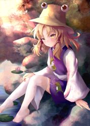 Rule 34 | 1girl, animal print, blonde hair, blush, closed mouth, commentary request, eyelashes, frog print, highres, lily pad, long sleeves, looking at viewer, medium hair, moriya suwako, orchid (orukido), purple skirt, purple vest, pyonta, sidelocks, sitting, skirt, smile, solo, thighhighs, touhou, vest, white thighhighs, wide sleeves