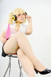 Rule 34 | 1girl, adjusting eyewear, asian, blonde hair, breasts, cleavage, clipboard, cosplay, downblouse, fat, glasses, headphones, jewelry, large breasts, necklace, nitroplus, office lady, on one knee, photo (medium), red eyes, sakurako (cosplayer), solo, star (symbol), super pochaco, super pochaco (cosplay), twintails