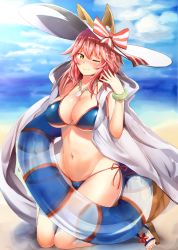 Rule 34 | 10s, 1girl, animal ears, beach, bikini, blue bikini, blush, breasts, cleavage, day, ears through headwear, fate/extra, fate/grand order, fate (series), fox ears, fox tail, hat, highres, innertube, large breasts, light smile, long hair, looking at viewer, nanasumi (pantie party project), navel, ocean, one eye closed, outdoors, pink hair, solo, swim ring, swimsuit, tail, tamamo (fate), tamamo no mae (fate/extra), tamamo no mae (swimsuit lancer) (fate), tamamo no mae (swimsuit lancer) (third ascension) (fate), yellow eyes