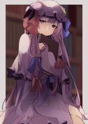 Rule 34 | 1girl, blue ribbon, book, bookshelf, capelet, commentary, crescent, crescent pin, dress, hair ribbon, hat, hat ribbon, highres, holding, holding book, hugging book, hugging object, long hair, long sleeves, looking at viewer, mob cap, patchouli knowledge, purple dress, purple eyes, purple hair, purple hat, red ribbon, ribbon, solo, touhou, tsushi, upper body