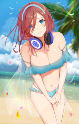 Rule 34 | 1girl, bare arms, bare legs, bare shoulders, beach, between legs, bikini, bird, blue bikini, blue eyes, blue headwear, blush, breasts, cleavage, closed mouth, cloud, collarbone, cowboy shot, day, eyes visible through hair, go-toubun no hanayome, hair over one eye, hand between legs, headband, headphones, headphones around neck, highres, large breasts, leaning to the side, long hair, looking at viewer, nakano miku, navel, ocean, outdoors, petals, red hair, sand, sarong, seagull, see-through, sidelocks, sky, smile, solo, standing, stomach, strapless, strapless bikini, string bikini, swept bangs, swimsuit, uiri-na, veil, water