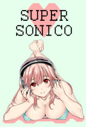 Rule 34 | 1girl, barefoot, blush, breasts, cleavage, full body, green background, hands on headphones, headphones, heart, large breasts, looking at viewer, lying, nitroplus, on stomach, simple background, smile, solo, spanking momoko, super sonico