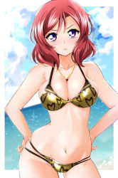 Rule 34 | 1girl, bikini, blue sky, blush, breasts, closed mouth, cloud, commentary request, day, frown, gold bikini, hands on own hips, heart, heart print, highres, jewelry, kirisaki reina, large breasts, looking at viewer, love live!, love live! school idol project, navel, necklace, nishikino maki, ocean, outdoors, purple eyes, red hair, short hair, sky, solo, swimsuit, wet