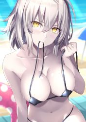 Rule 34 | 1girl, absurdres, beach, bikini, black bikini, blurry, blurry background, blush, breasts, collarbone, day, fate/grand order, fate (series), hair between eyes, head tilt, highres, innertube, jeanne d&#039;arc alter (swimsuit berserker) (fate), jeanne d&#039;arc (fate), jeanne d&#039;arc alter (avenger) (fate), jeanne d&#039;arc alter (fate), large breasts, looking at viewer, mouth hold, navel, outdoors, rin yuu, shiny skin, short hair, silver, sitting, solo, sunlight, swim ring, swimsuit, undersized clothes, untied bikini, yellow eyes