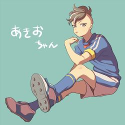 Rule 34 | 1boy, :p, bad id, bad pixiv id, blue socks, brown eyes, brown hair, character name, cleats, fudou akio, inazuma eleven, inazuma eleven (series), inazuma japan, kneehighs, kudou akira, looking at viewer, male focus, mohawk, shorts, simple background, sitting, soccer uniform, socks, solo, sportswear, tongue, tongue out
