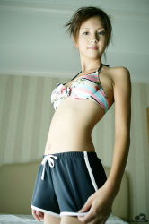 Rule 34 | bed, bikini, bikini top only, highres, nagasaki rina, photo (medium), shorts, swimsuit, tagme