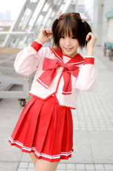 Rule 34 | 1girl, asian, brown hair, cosplay, kipi-san, looking at viewer, mole, outdoors, photo (medium), school uniform, serafuku, short hair, smile, solo, to heart (series), to heart 2, twintails, yuzuhara konomi, yuzuhara konomi (cosplay)