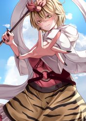 Rule 34 | 1girl, animal print, bishamonten&#039;s spear, black hair, black nails, blonde hair, blue sky, closed mouth, cloud, cowboy shot, hair ornament, highres, holding, holding polearm, holding weapon, long sleeves, looking at viewer, mahoro (minase mahoro), multicolored hair, nail polish, o-ring, outdoors, polearm, shawl, sky, smile, solo, streaked hair, tiger print, toramaru shou, touhou, v-shaped eyebrows, weapon, wide sleeves, yellow eyes