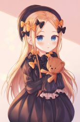 Rule 34 | 1girl, abigail williams (fate), absurdres, backlighting, black bow, black dress, black hat, blonde hair, blue eyes, blush, bow, breasts, commentary, dress, fate/grand order, fate (series), forehead, hair bow, hat, highres, holding, holding stuffed toy, huge filesize, long hair, long sleeves, looking at viewer, monjja, multiple hair bows, orange bow, parted bangs, parted lips, ribbed dress, sleeves past fingers, sleeves past wrists, small breasts, solo, stuffed animal, stuffed toy, teddy bear