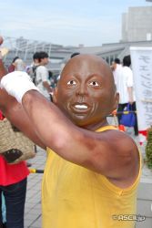 Rule 34 | 1boy, asian, billy blanks, cosplay, dark-skinned male, dark skin, day, mask, outdoors, photo (medium), real life, solo focus, what