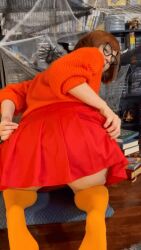Rule 34 | animated, ass, bent over, brown hair, cherrysenpai, cosplay, highres, orange sweater, photo (medium), real life, scooby-doo, sweater, tagme, velma dace dinkley, velma dace dinkley (cosplay), video