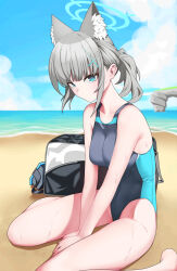 Rule 34 | 1girl, animal ear fluff, animal ears, aqua halo, arm support, bag, bare shoulders, beach, between legs, blue archive, blue eyes, blue one-piece swimsuit, breasts, cloud, collarbone, commentary, competition swimsuit, cropped legs, cross, cross hair ornament, day, grey hair, hair ornament, halo, highres, horizon, inverted cross, looking at viewer, medium breasts, mismatched pupils, mixed-language commentary, ocean, official alternate costume, one-piece swimsuit, outdoors, ponytail, shiroko (blue archive), shiroko (swimsuit) (blue archive), short hair, sidelocks, sitting, solo, swimsuit, wariza, wet, wo475712, wolf ears, wolf girl