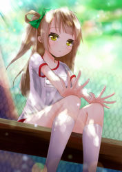 Rule 34 | 10s, 1girl, bad id, bad pixiv id, bow, collarbone, day, from below, green bow, gym uniform, hair bow, hands on own knees, highres, kneehighs, light brown hair, long hair, looking at viewer, love live!, love live! school idol project, minami kotori, one side up, outdoors, parted lips, rokuroku (xd p), shirt, short sleeves, sitting, socks, solo, white socks, white shirt, yellow eyes