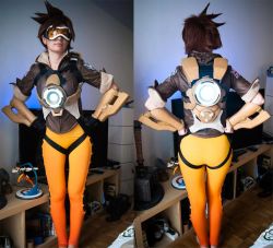 Rule 34 | 1girl, ardsami, ass, back, barefoot, belt, bodysuit, brown hair, cosplay, feet, figure, from behind, goggles, hammer, leggings, looking at viewer, overwatch, overwatch 1, room, short hair, spandex, television, tracer (overwatch), vest, wall