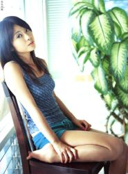 Rule 34 | 1girl, asian, blurry, breasts, camisole, depth of field, hasebe yu, long hair, looking at viewer, photo (medium), shorts, sitting, small breasts, solo, tagme