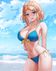 Rule 34 | 1girl, arms behind back, aztodio, bare shoulders, beach, bikini, blonde hair, blue bikini, blue eyes, blue sky, blush, breasts, cleavage, collarbone, hair ornament, hairclip, large breasts, looking at viewer, navel, nintendo, ocean, open mouth, parted bangs, pointy ears, princess zelda, shore, short hair, sidelocks, sky, smile, solo, swimsuit, the legend of zelda, the legend of zelda: breath of the wild, the legend of zelda: tears of the kingdom, thighs