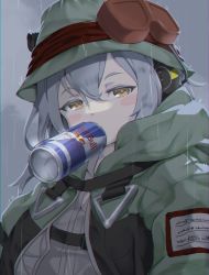 Rule 34 | 1girl, absurdres, blush stickers, bucket hat, coat, g11 (girls&#039; frontline), g11 (mod3) (girls&#039; frontline), girls&#039; frontline, goggles, goggles on headwear, green coat, green hat, grey shirt, greyscale, half-closed eyes, hat, headphones, highres, hood, hooded coat, kagami (haret46), long hair, looking at viewer, mod3 (girls&#039; frontline), monochrome, mouth hold, rain, red bull, shirt, solo, upper body, yellow eyes