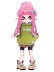 1girl 2018 :3 beanie black_shorts blunt_bangs blush_stickers boots brown_footwear brown_skirt captain_yue closed_mouth commentary dated full_body green_hoodie hands_in_pockets hat highres hood hood_down hoodie inkling inkling_girl inkling_player_character long_hair long_sleeves looking_at_viewer miniskirt nintendo pink_hair pink_hat pointy_ears red_eyes shorts shorts_under_skirt skirt smile solo splatoon_(series) splatoon_2 standing tentacle_hair