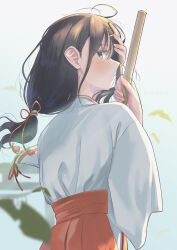 Rule 34 | 1girl, absurdres, alternate costume, black hair, blush, broom, falling leaves, floating hair, hair ribbon, hakama, highres, holding, holding broom, idolmaster, idolmaster shiny colors, japanese clothes, kazano hiori, leaf, long hair, looking at viewer, looking back, low-tied long hair, miko, mole, mole under mouth, ponytail, profile, red hakama, ribbon, solo, umirororo