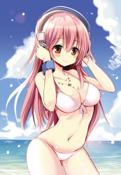 Rule 34 | 1girl, beach, bikini, blush, breasts, cleavage, headphones, highres, jewelry, large breasts, long hair, looking at viewer, maturiuta sorato, navel, necklace, nitroplus, ocean, outdoors, pink hair, red eyes, smile, solo, super sonico, swimsuit, water