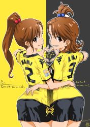 Rule 34 | 2girls, ass, borussia dortmund, brown eyes, commentary request, cowboy shot, from behind, futami ami, futami mami, grin, hair bobbles, hair ornament, heart, heart hands, heart hands duo, idolmaster, idolmaster (classic), inoue sora, long hair, looking at viewer, looking back, multiple girls, pantylines, short hair, shorts, siblings, side ponytail, sisters, smile, soccer, soccer uniform, sportswear, star (symbol), twins