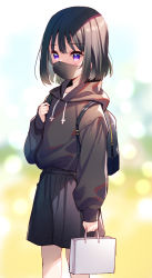 Rule 34 | 1girl, backpack, bag, black hair, black hoodie, black shorts, blurry, blurry background, depth of field, drawstring, hand up, highres, holding, holding bag, holding strap, hood, hood down, hoodie, long sleeves, mask, meito (maze), mouth mask, original, paper bag, puffy long sleeves, puffy sleeves, purple eyes, shorts, sleeves past wrists, solo, standing