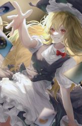 Rule 34 | 100th black market, 1girl, absurdres, apron, black apron, blonde hair, blurry, blush, bow, buttons, card, character request, commentary request, depth of field, dress, floating, hat, highres, long hair, looking away, maid, multicolored buttons, outstretched arm, puffy sleeves, red bow, red eyes, simple background, smile, solo, toku kekakewanko, touhou, white dress, yellow background