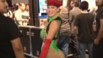 Rule 34 | 1girl, animated, ass, beret, blonde hair, boots, braid, breasts, cammy white, cammy white (cosplay), cosplay, fingerless gloves, from behind, gloves, hat, leotard, looking back, pantyhose, photo (medium), red gloves, smile, street fighter, tagme, thong leotard, twin braids, twintails, video, video