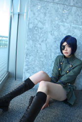 Rule 34 | 1girl, asian, black socks, blue hair, blurry, boots, breasts, chrome dokuro, color contacts, cosplay, cross-laced footwear, depth of field, eyepatch, female focus, highres, indoors, katekyo hitman reborn!, lace-up boots, looking afar, makeup, mascara, midriff, miniskirt, namada, on floor, parted lips, photo (medium), pleated skirt, polearm, rug, short hair, sitting, skirt, skull and crossbones, skull belt, small breasts, socks, solo, trident, uniform, weapon