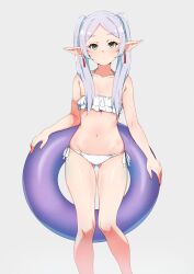 Rule 34 | 1girl, bare shoulders, bikini, blush, closed mouth, collarbone, commentary request, earrings, elf, frieren, frilled bikini, frills, gluteal fold, green eyes, grey hair, halterneck, highres, holding, holding swim ring, innertube, jewelry, kamidan, long hair, looking at viewer, navel, parted bangs, pointy ears, purple innertube, side-tie bikini bottom, simple background, solo, sousou no frieren, stomach, swim ring, swimsuit, twintails, white bikini