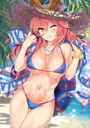 Rule 34 | 1girl, ;3, animal ear fluff, animal ears, bare arms, bare shoulders, beach, bikini, blue bikini, blue sky, blush, bracelet, breasts, closed mouth, cloud, commentary request, cowboy shot, day, dutch angle, ears through headwear, fate/extra, fate/grand order, fate (series), fox ears, fox girl, fox tail, gluteal fold, hair between eyes, hat, highres, hip focus, holding, innertube, jewelry, kawai (purplrpouni), large breasts, leaf, long hair, looking at viewer, navel, necklace, ocean, one eye closed, outdoors, palm tree, pink hair, sash, shiny skin, sidelocks, sky, smile, solo, standing, straw hat, string bikini, sun hat, sunlight, swim ring, swimsuit, tail, tamamo (fate), tamamo no mae (fate/extra), tamamo no mae (swimsuit lancer) (fate), tamamo no mae (swimsuit lancer) (second ascension) (fate), thigh gap, thighs, tree, umbrella, water, yellow eyes
