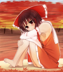 Rule 34 | 1girl, armpits, bare shoulders, barefoot, blush, bow, detached sleeves, feet, hair bow, hair tubes, hakurei reimu, highres, holding legs, leg hold, hugging own legs, sitting, solo, sunset, toe scrunch, toes, touhou, zuttokodomo