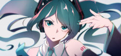 Rule 34 | 1girl, arm up, blue eyes, blue necktie, collar, detached sleeves, finger gun, hatsune miku, headset, highres, kasoku souchi, long hair, looking at viewer, nail polish, necktie, neckwear request, open mouth, shoulder tattoo, simple background, solo, tattoo, twintails, upper body, vocaloid