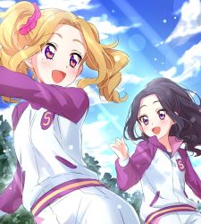 Rule 34 | 2girls, :d, aikatsu!, aikatsu! (series), black hair, blonde hair, blue sky, blush, breasts, cloud, cloudy sky, commentary request, daichi nono, day, gym shorts, gym uniform, highres, jacket, long hair, long sleeves, looking at another, looking back, medium hair, mole, mole under eye, multiple girls, open mouth, outdoors, ponytail, purple eyes, running, scrunchie, sekina, shirakaba risa, shorts, side ponytail, sky, small breasts, smile, sunlight, tree