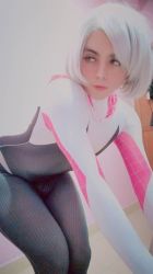 Rule 34 | 1boy, all fours, androgynous, bodysuit, bulge, cosplay, darkwaifutrap, gloves, hood, lips, looking to the side, marvel, panties, photo (medium), red panties, shiny clothes, simple background, solo, spider-gwen, spider-gwen (cosplay), spider-man (series), standing, thigh gap, trap, underwear, white gloves