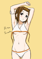 Rule 34 | 00s, 1girl, armpits, arms up, bikini, blush, breasts, brown eyes, brown hair, character name, english text, hairband, holding own arm, k-on!, looking at viewer, matching hair/eyes, navel, parted lips, short hair, simple background, small breasts, solo, standing, swimsuit, tainaka ritsu, text focus, tsukkun, untied bikini, yellow background