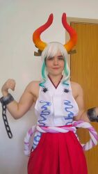Rule 34 | 1girl, animated, aqua hair, armpits, audible music, bare shoulders, bouncing breasts, brazilian (nationality), breasts, club (weapon), cosplay, cristinysam, door, earrings, facing viewer, female focus, from side, grin, highres, holding, holding club, holding weapon, hoop earrings, horns, indoors, jewelry, looking at viewer, medium breasts, multicolored hair, muscular, muscular arms, muscular female, no bra, one piece, parted lips, photo (medium), real life, sideboob, smile, solo, sound, tagme, teeth, upper body, upper teeth only, video, weapon, white background, white hair, yamato (one piece), yamato (one piece) (cosplay)