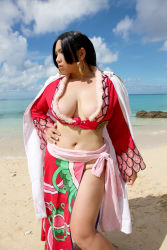 Rule 34 | 1girl, amazon lily, amazon warrior, asian, black hair, blue eyes, boa hancock, boa hancock (cosplay), breasts, chouzuki maryou, cosplay, curvy, earrings, female focus, hand on own hip, hip focus, jacket, jacket on shoulders, jewelry, large breasts, one piece, outdoors, photo (medium), plump, solo, thick thighs, thighs, wide hips