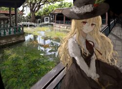 Rule 34 | 1girl, blonde hair, bridge, brown hat, brown skirt, brown vest, building, collared shirt, cross, dolls in pseudo paradise, fedora, frilled hat, frills, hat, hat feather, highres, holding, holding cross, jacket girl (dipp), long hair, long sleeves, looking at viewer, nature, outdoors, red eyes, red ribbon, ribbon, shirt, skirt, smile, solo, touhou, tree, uran 92, vest, water, wavy hair, wetland, white shirt