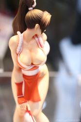 Rule 34 | 1girl, breasts, brown hair, cleavage, folded fan, hand fan, fatal fury, figure, folding fan, large breasts, long hair, pelvic curtain, photo (medium), ponytail, revealing clothes, shiranui mai, snk, solo, the king of fighters, watermark, wonder festival, wonder festival 2007
