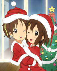 2girls blush brown_eyes brown_hair christmas christmas_tree dot_nose feet_out_of_frame female_focus hair_ornament hairclip hat hirasawa_ui hirasawa_yui hug k-on! long_sleeves looking_at_viewer multiple_girls night one_eye_closed open_mouth orangepengin21 santa_costume santa_hat short_hair siblings sisters standing teeth