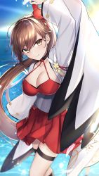 Rule 34 | 1girl, arm up, azur lane, blush, breasts, brown hair, cleavage, closed mouth, collarbone, hair ornament, highres, japanese clothes, jyu-so, large breasts, long hair, long sleeves, looking at viewer, ocean, outdoors, pleated skirt, red skirt, skirt, smile, thigh strap, thighs, water, zuikaku (azur lane)
