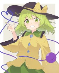 Rule 34 | 1girl, black hat, blouse, border, bow, brown background, closed mouth, collar, crystal, eyes visible through hair, frills, green collar, green eyes, green hair, green skirt, hair between eyes, hand up, hat, hat bow, highres, holding, kanpa (campagne 9), komeiji koishi, long sleeves, looking at viewer, shirt, short hair, simple background, skirt, smile, solo, teeth, third eye, touhou, white border, wide sleeves, yellow bow, yellow shirt, yellow sleeves